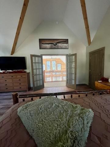 bedroom featuring high vaulted ceiling, beam ceiling, and french doors