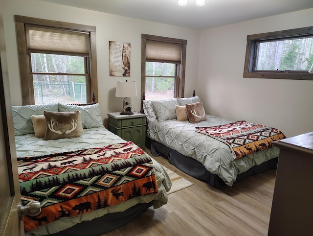 bedroom with light wood-type flooring
