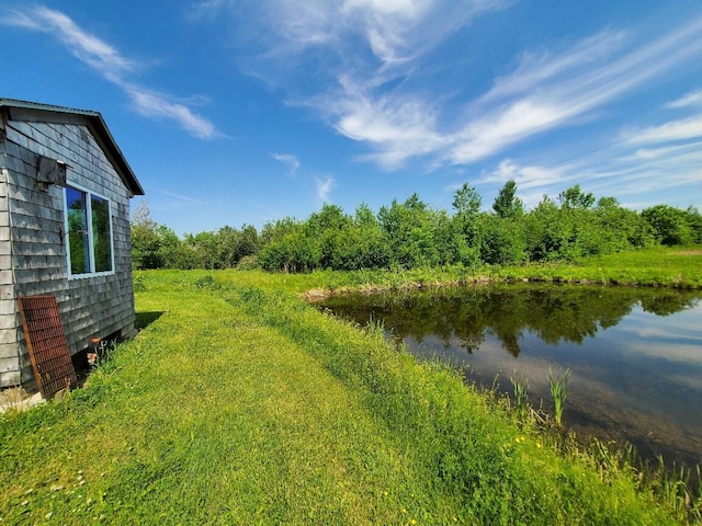 view of yard with a water view