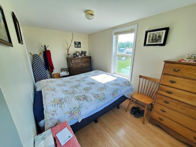 bedroom with light hardwood / wood-style flooring