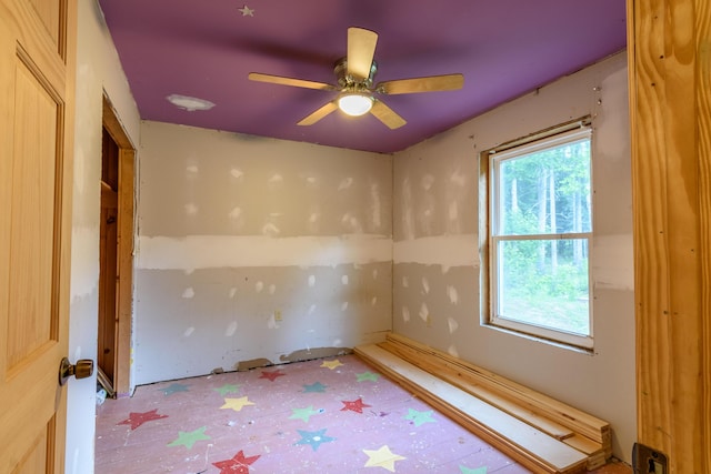 spare room with ceiling fan