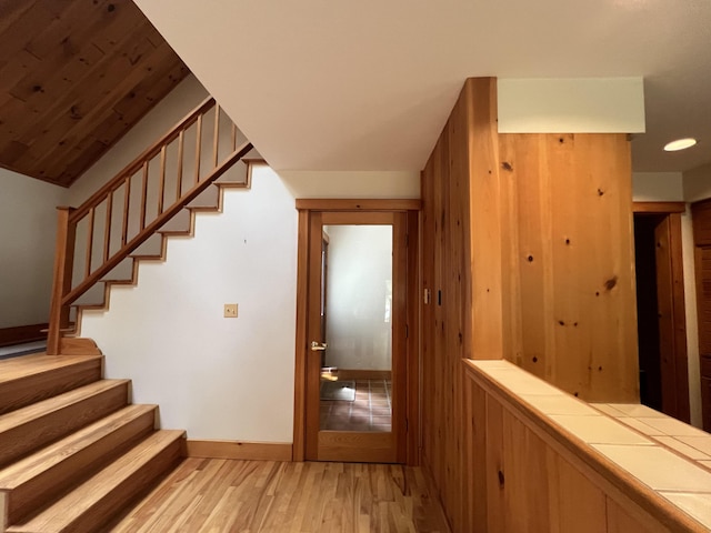 stairway with wood-type flooring