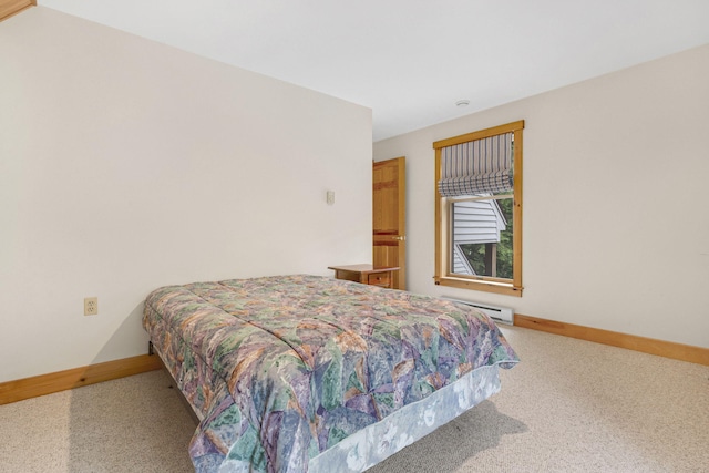 937 N Rd, Bethel, ME 04217 - carpeted bedroom featuring a baseboard radiator and baseboards