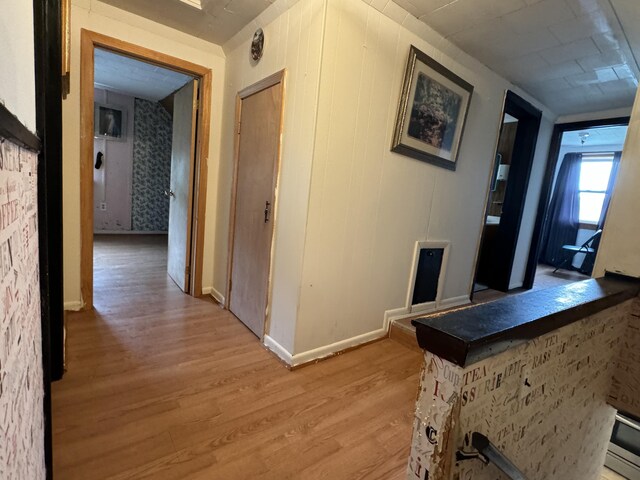 hallway featuring light hardwood / wood-style flooring