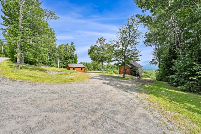 view of front of house with an outbuilding