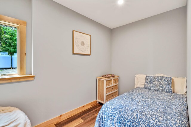 bedroom featuring hardwood / wood-style floors