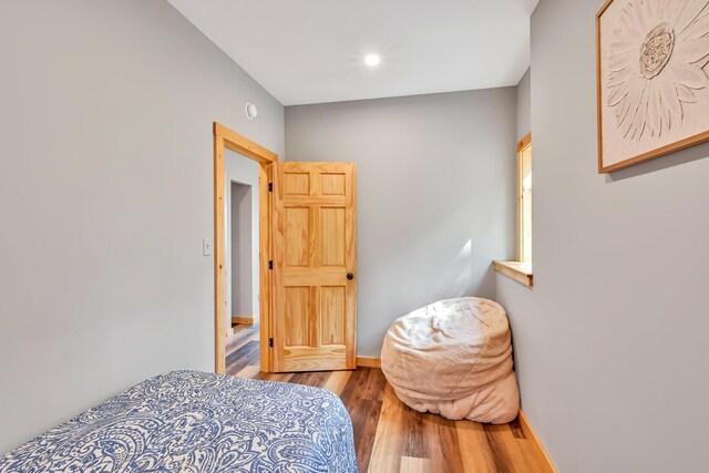 bedroom featuring hardwood / wood-style flooring