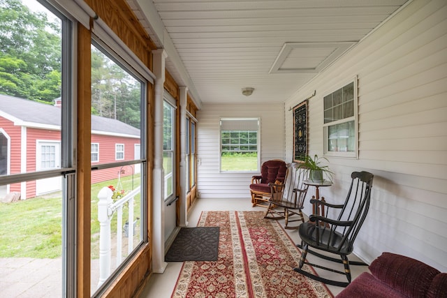 sunroom / solarium featuring plenty of natural light