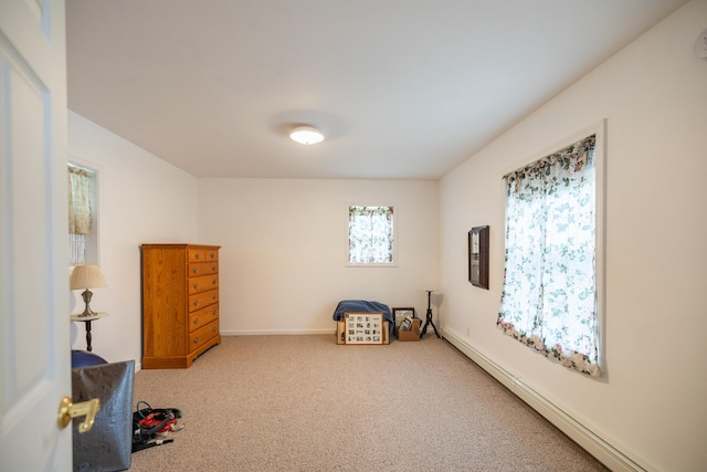 interior space featuring carpet floors and a baseboard radiator