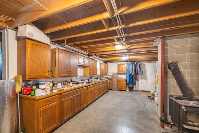 basement featuring a wood stove