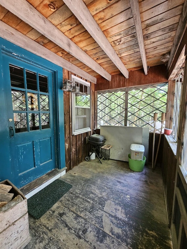 misc room featuring beam ceiling and wood ceiling