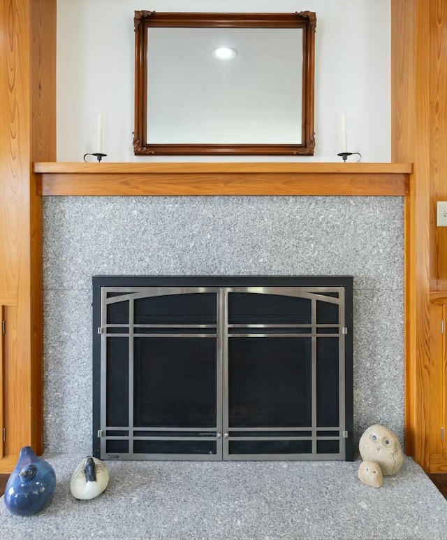 interior details featuring a high end fireplace