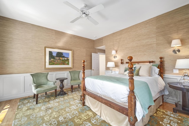 bedroom featuring ceiling fan and light hardwood / wood-style floors