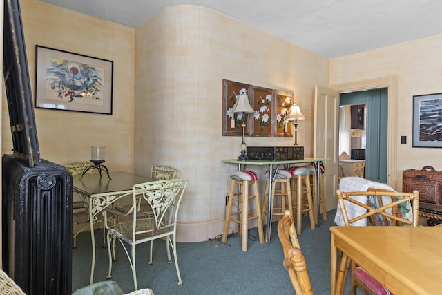 view of carpeted dining space