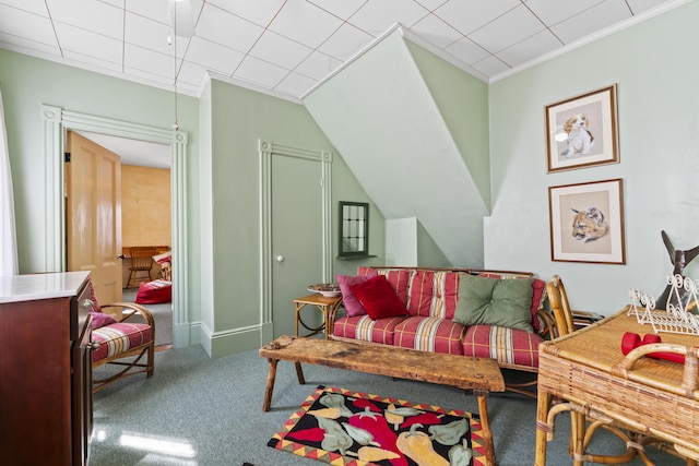 living room with ornamental molding and carpet flooring