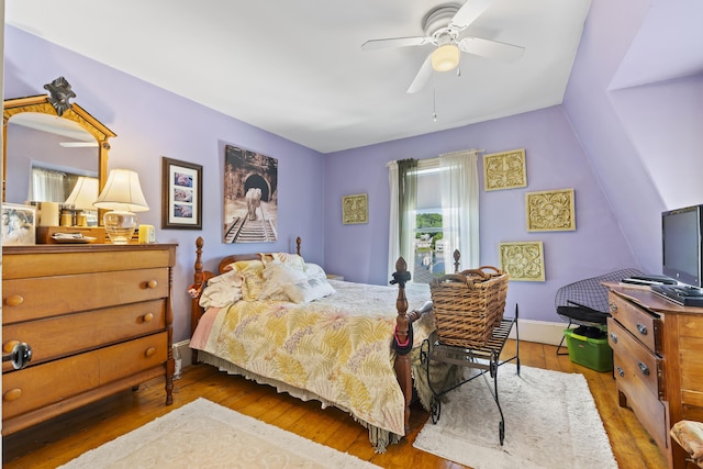 bedroom featuring ceiling fan and wood-type flooring