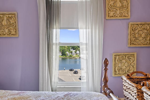 bedroom with a water view