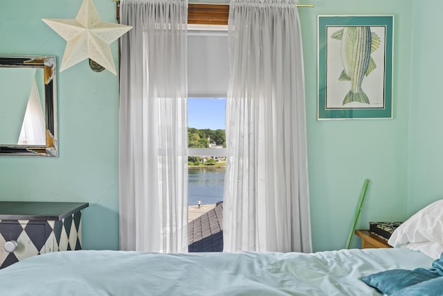 bedroom with a water view