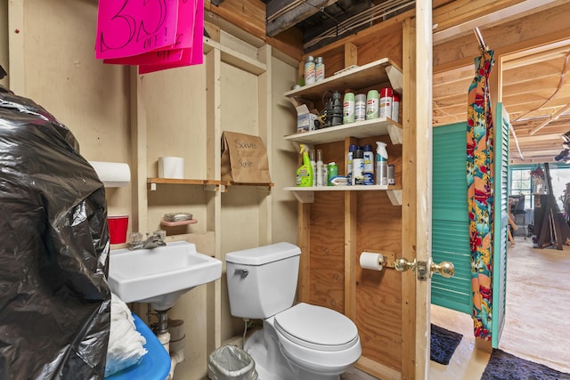 bathroom featuring sink and toilet