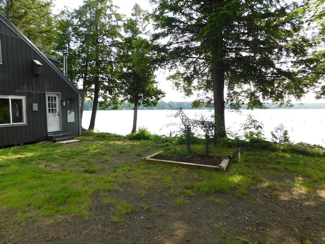 view of yard with a water view