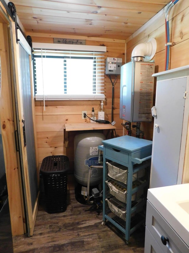 utility room with tankless water heater