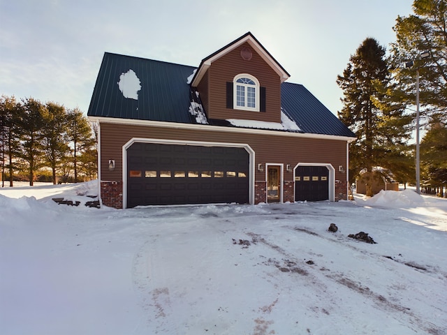 view of snow covered garage