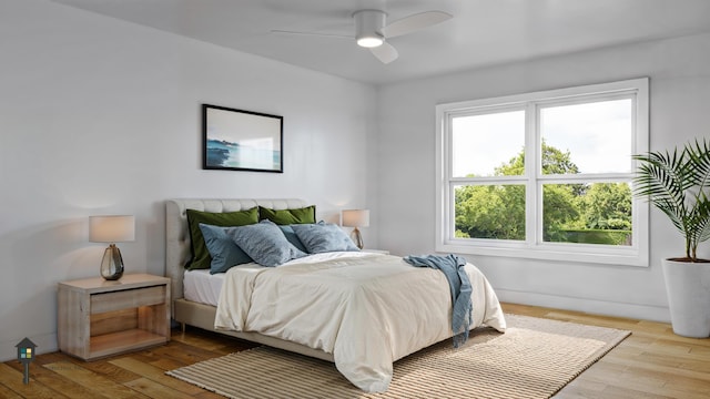 LOT17 Sagamore Dr Unit 17, Tbb, Phippsburg, ME 04562 - bedroom with ceiling fan, baseboards, and hardwood / wood-style floors