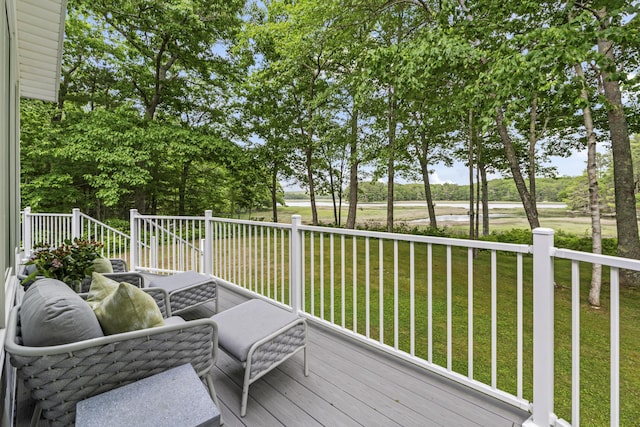 wooden terrace with a yard