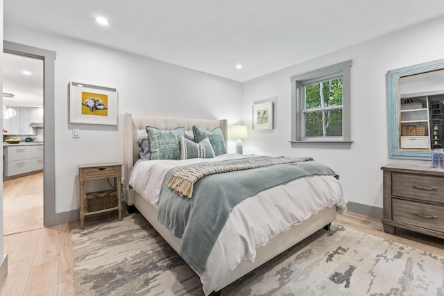 bedroom featuring light hardwood / wood-style flooring