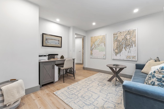 office area with light wood-type flooring