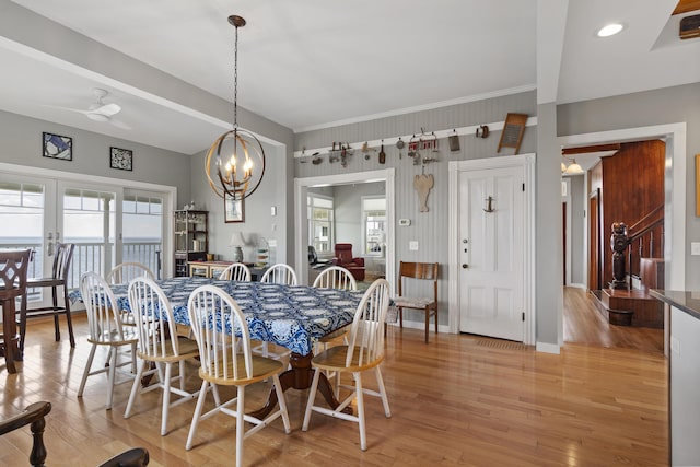 dining area featuring plenty of natural light, light hardwood / wood-style floors, french doors, and ceiling fan