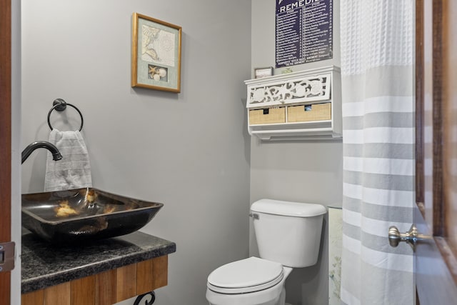 bathroom with sink and toilet