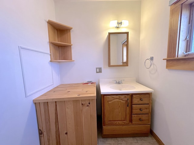 bathroom with vanity and tile patterned floors