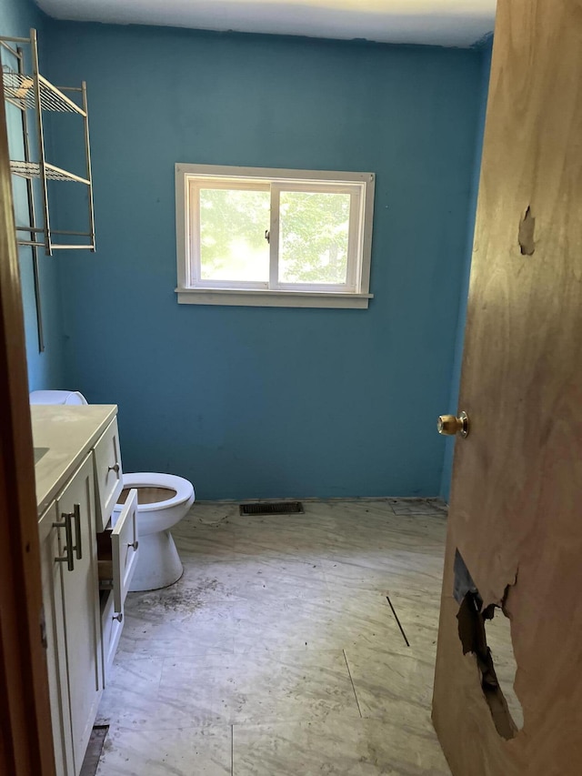 161 Bog Rd, Rockland, ME 04841 - bathroom with toilet, vanity, and visible vents