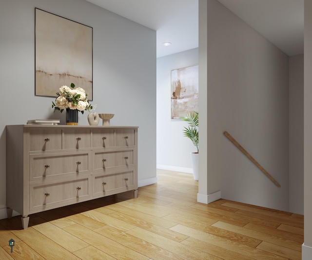 corridor with light wood-style floors, recessed lighting, an upstairs landing, and baseboards