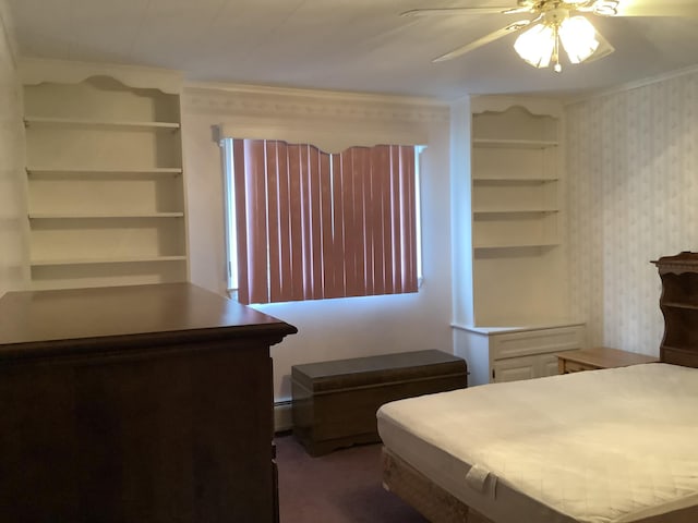 bedroom with ceiling fan and dark colored carpet