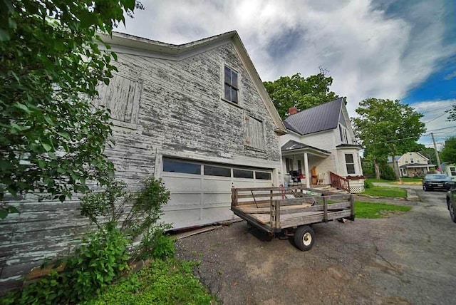 exterior space with a garage