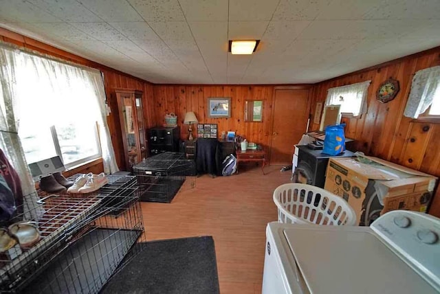 interior space with washer / dryer and wooden walls