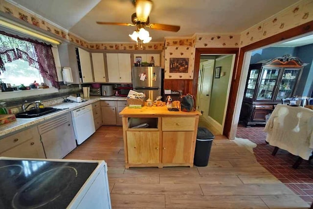 kitchen with ceiling fan, white appliances, and sink