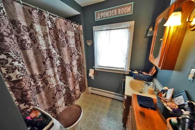 bathroom with vanity and a baseboard radiator