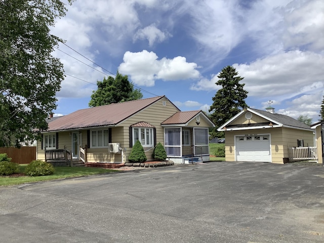 single story home with a porch