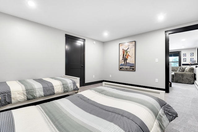 bedroom featuring recessed lighting, light carpet, and baseboards