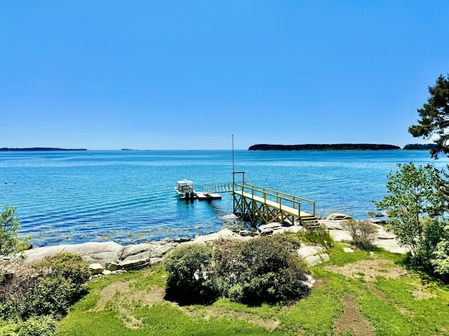 view of dock with a water view