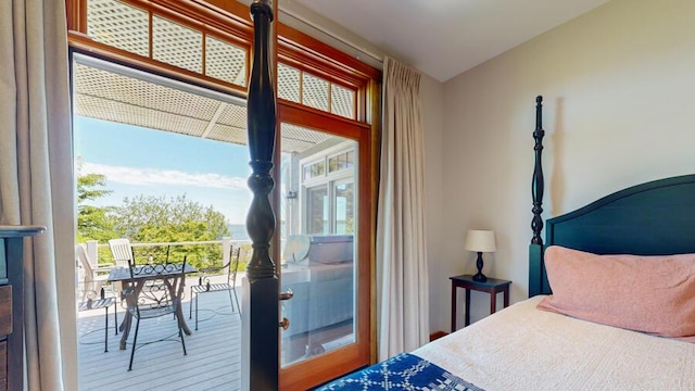 bedroom featuring multiple windows and french doors