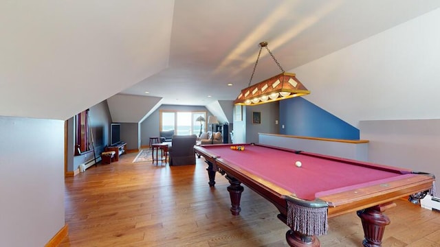 rec room with hardwood / wood-style floors, a baseboard radiator, lofted ceiling, and billiards