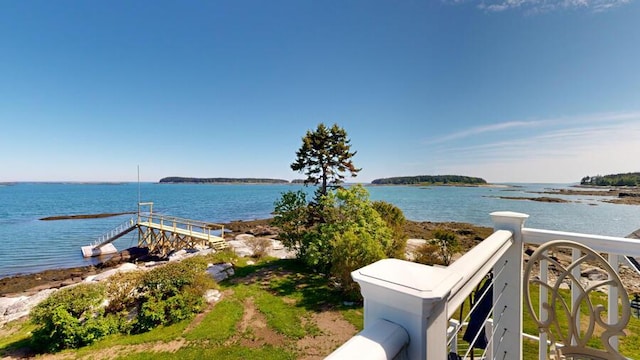 view of water feature with a dock