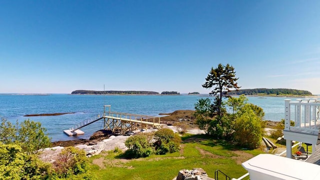 view of water feature with a dock