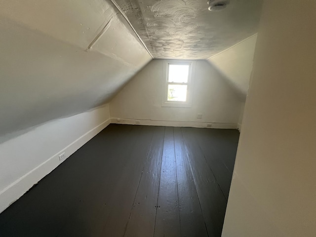 1 Bridge St, Berwick, ME 03901 - additional living space featuring vaulted ceiling and dark wood-style flooring