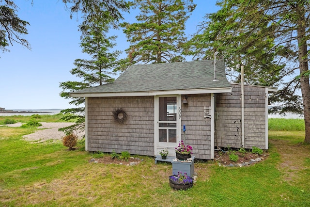 view of outbuilding with an outbuilding