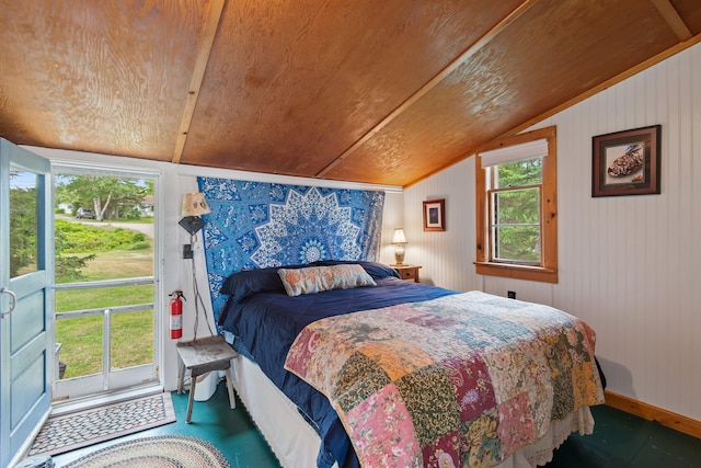 bedroom featuring lofted ceiling, wood ceiling, and wood walls